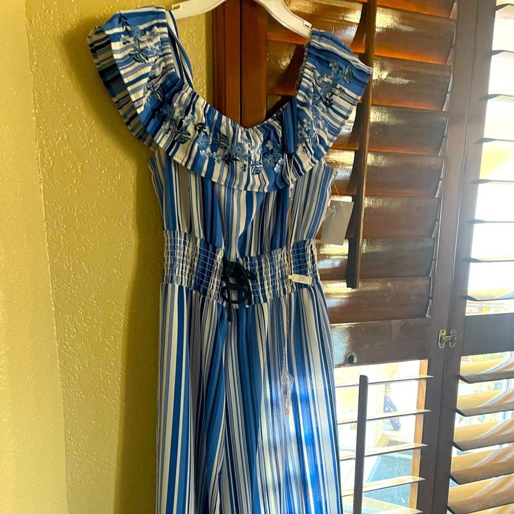 Beautiful size 14 girls jumpsuit. Brand new just in time for Easter